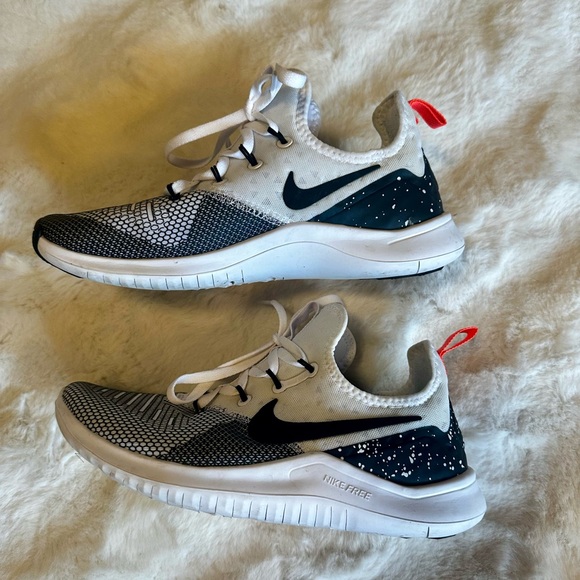 Women’s Nike Free Black and White Sneakers with Orange Accents - Picture 1 of 7